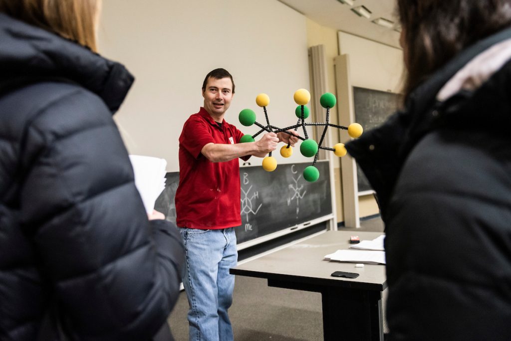 Matt Bowman holding model of molecule
