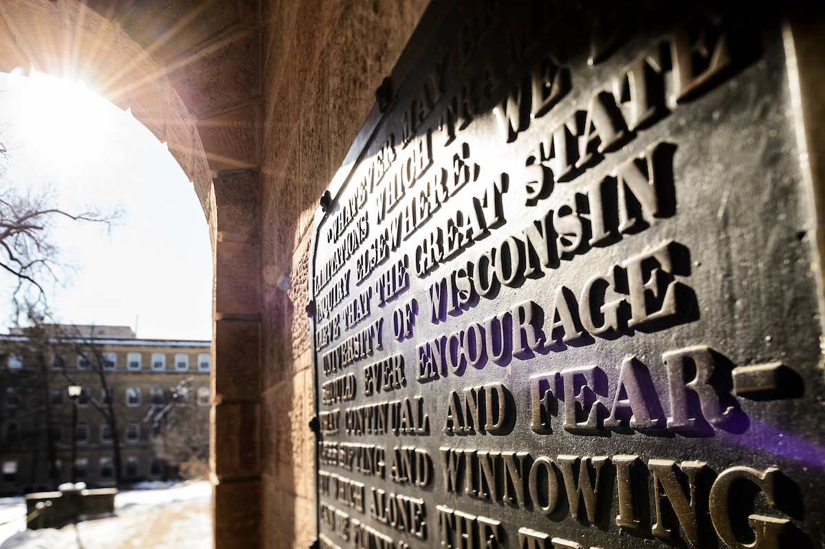 winter-morning sunlight shines upon a close-up view of the letters on the