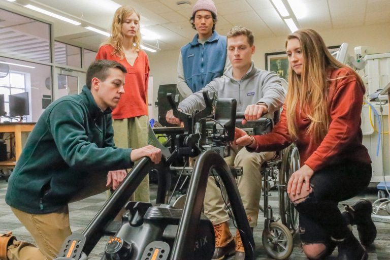 Biomedical engineering undergraduate students Josh Andreatta, Annabel Frake, Tim Tran, Samuel Skirpan and Roxi Reuter have taken a standard rowing machine and modified it so that it’s easily convertible for users in wheelchairs.