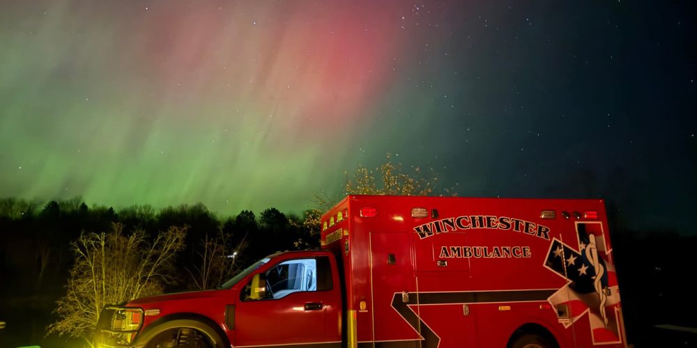 A red ambulance with the words 